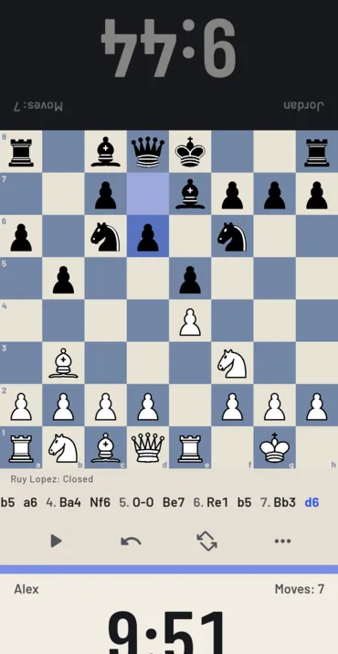 Clock and scoresheet: each face turned to its player, the board between, and the opening named as you play