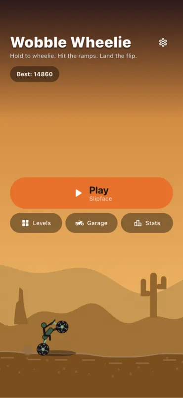 The title screen: the rider holding a wheelie on the desert road, with Play, Levels, Garage and Stats